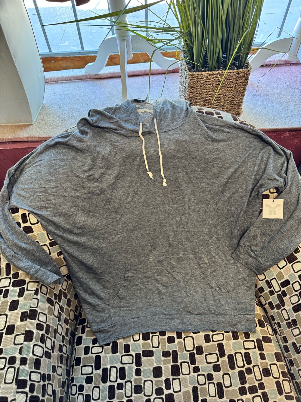 Tresics woman’s Heather Gray Hooded Pullover with Drawstring